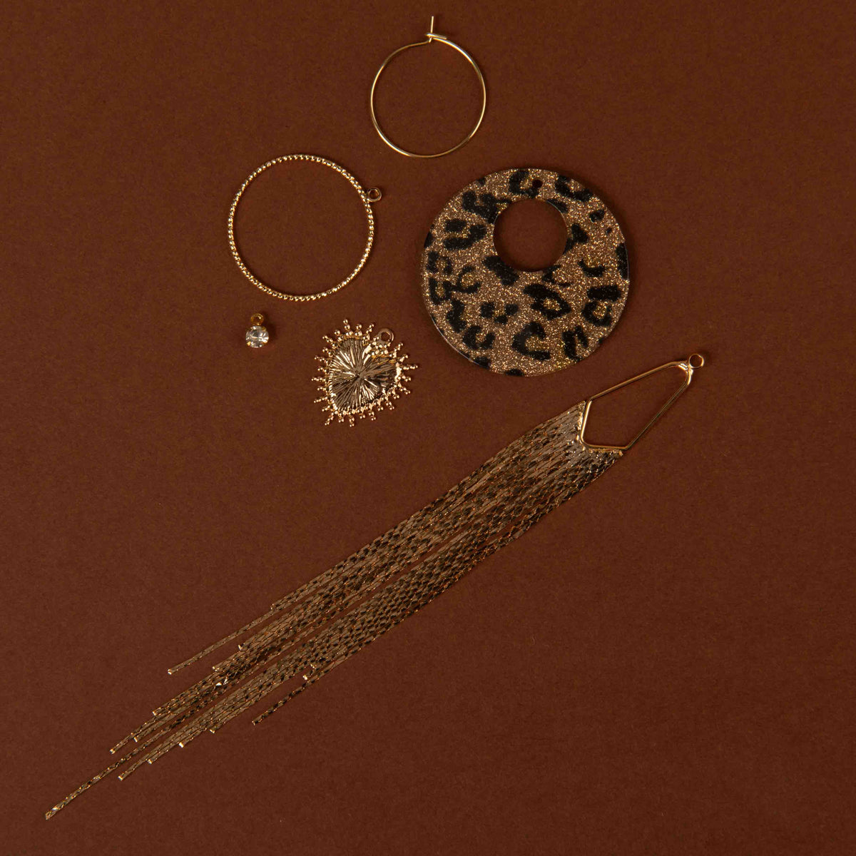 Pendentif rond léopard pailleté
